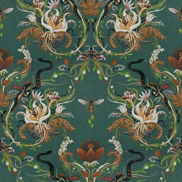 Deep forest-teal fabric with mirrored ivory blooms, black serpents and rust-gold foliage