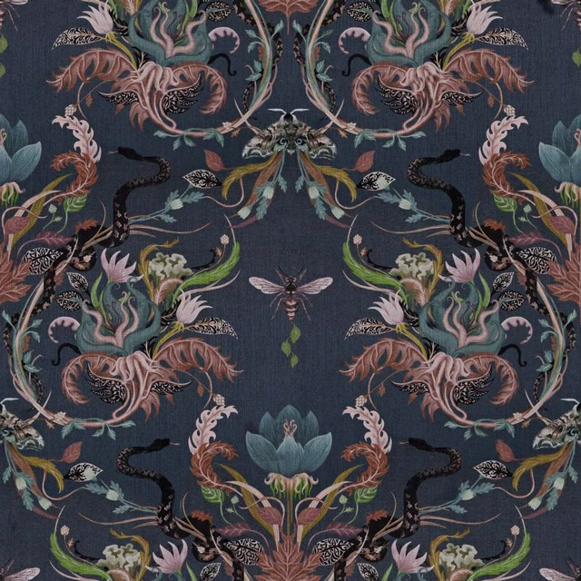 Deep blue-grey textile with mirrored serpents, curling botanicals and fine vertical texture