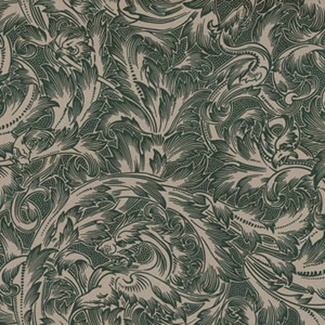Dense curling foliage in muted grey-green with pale stone woven highlights