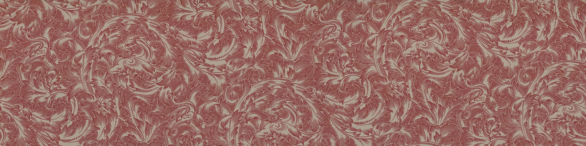 Muted terracotta woven swatch with cream scrolling foliage and fine botanical detail