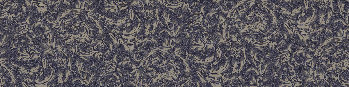 Charcoal blue-grey textile with dense scrolling foliage and softly mottled woven texture