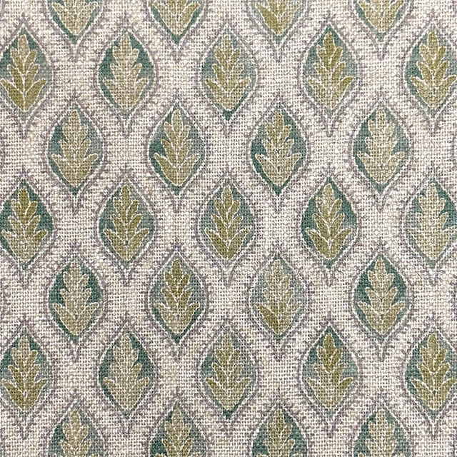 Textured cream fabric with repeating sage, olive and teal leaf motifs