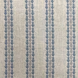 Linen-beige woven fabric with repeated muted blue leaf stripes and tactile texture