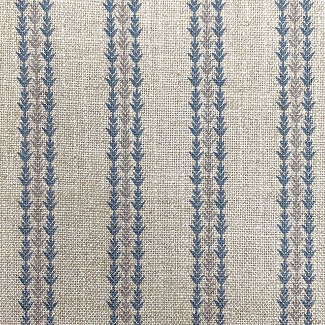 Linen-beige woven fabric with repeated muted blue leaf stripes and tactile texture