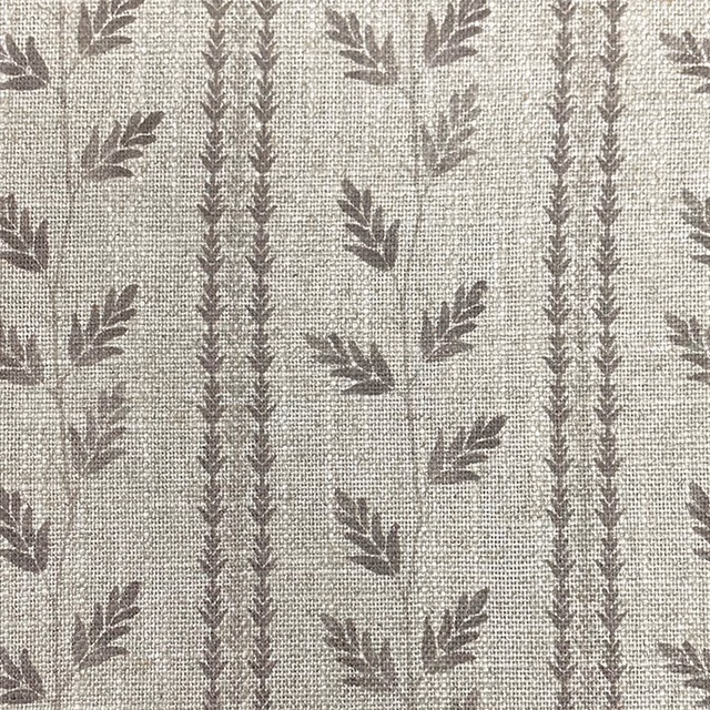 Taupe-grey woven ground with muted brown leaf sprigs and vertical vine bands