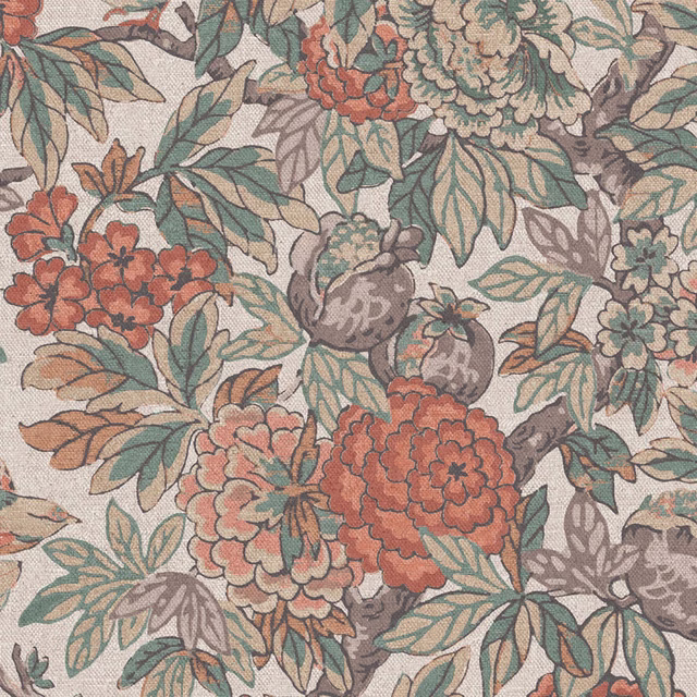 Coral and sage floral branches with grey-lilac leaves on a warm stone ground