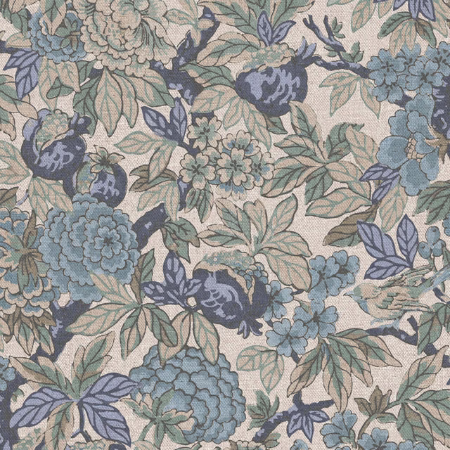 Dense dusty blue and sage floral fabric on a warm cream ground with leafy motifs