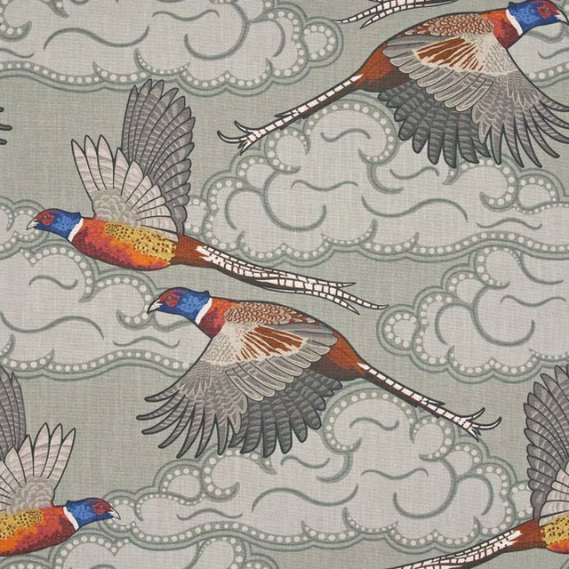 Muted grey-green fabric with rust and blue pheasants among scrolling cloud motifs
