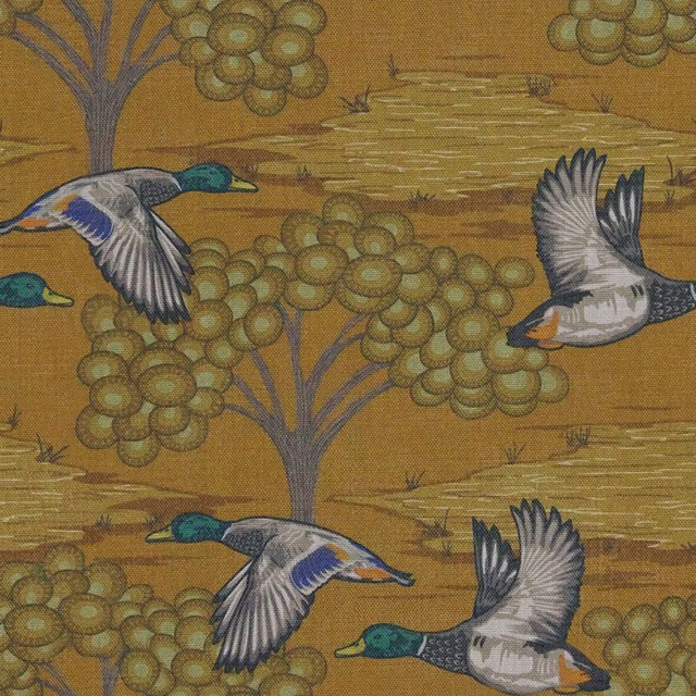 Muted ochre fabric with flying mallards, clustered trees and blue-grey botanical detail