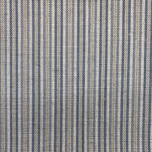 Muted denim-blue and ivory narrow vertical stripes in a tactile woven close-up