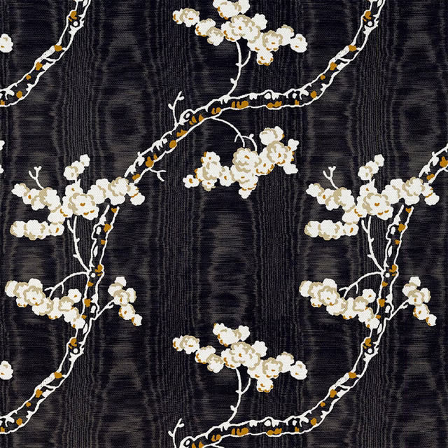 Near-black textured ground with ivory blossom branches and tiny ochre accents