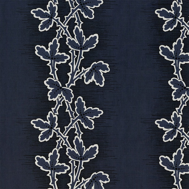 Deep denim woven ground with cream-edged trailing leaf and blossom motifs