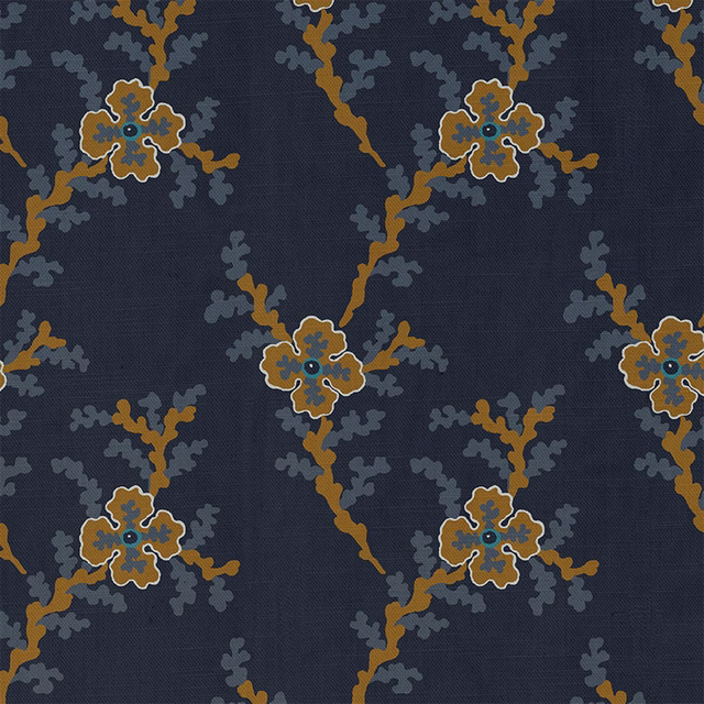 Deep indigo fabric with ochre flowers and blue-grey branching foliage