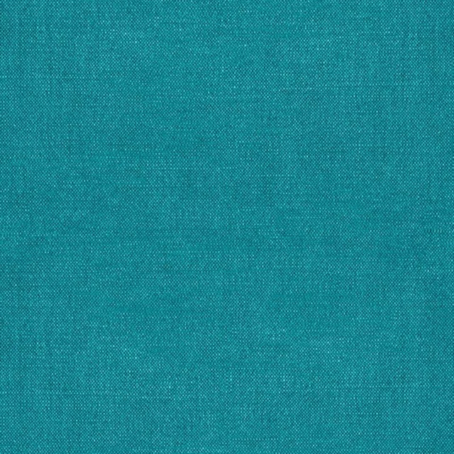 Close-up of cool marine teal fabric with a fine turquoise woven texture
