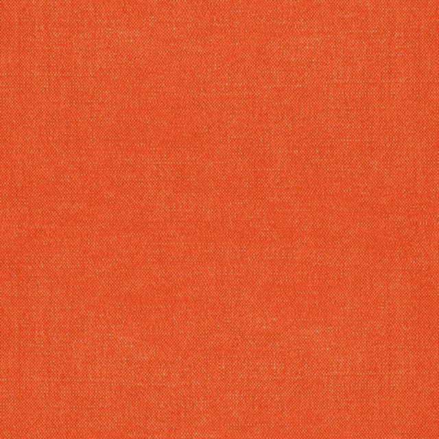 Close-up of warm coral-orange Whitewell fabric with a fine, even woven texture