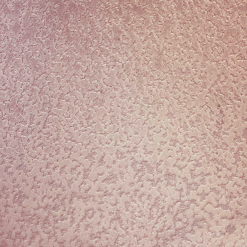 Dusty blush pink fabric with softly raised, mottled mineral-like texture
