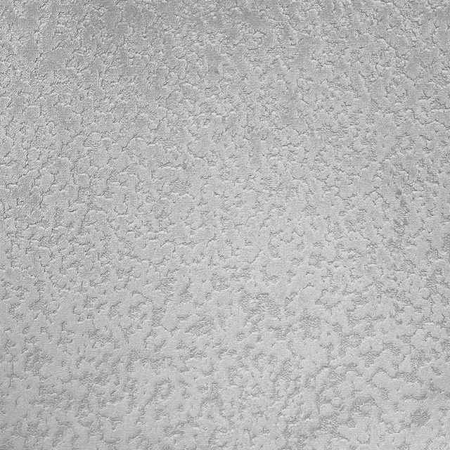 Pale dove-grey fabric with dense irregular raised texture and mottled relief