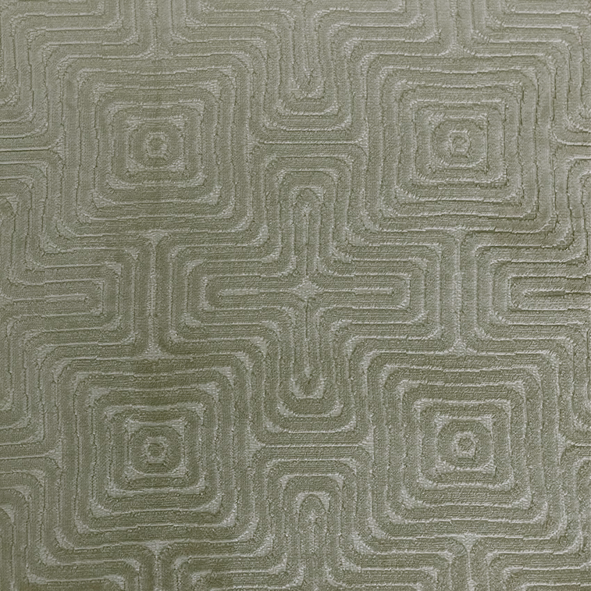 Muted sage-fern woven textile with raised tonal maze lines and square motifs