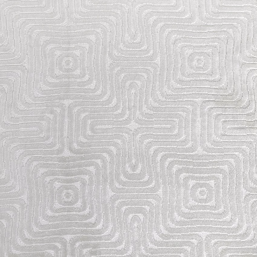 Pale oyster-grey textile with raised interlocking maze lines and soft woven texture