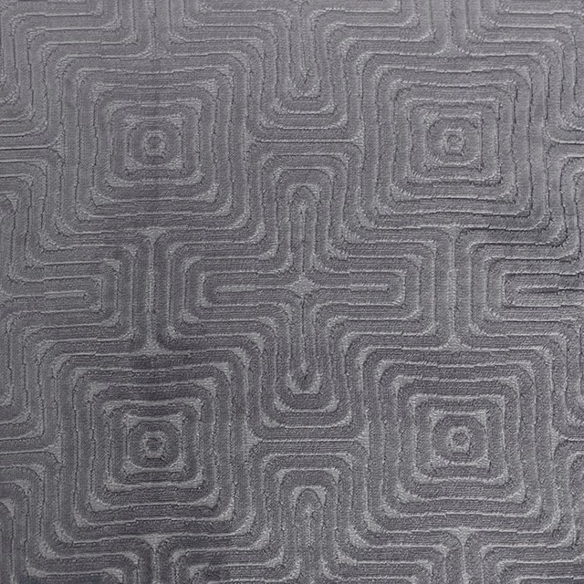 Cool seal-grey textile with raised tonal maze lines in a dense woven surface