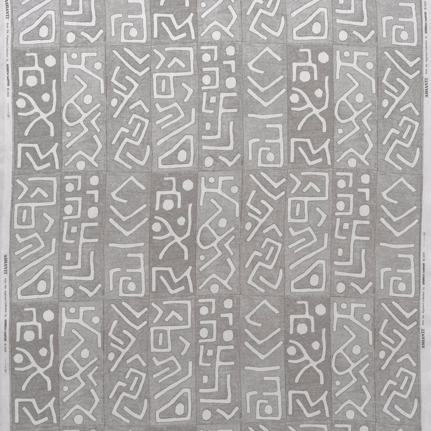 Smoky-grey fabric with repeating ivory abstract geometric symbols and subtle surface texture