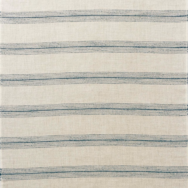 Warm ivory stripe fabric with irregular denim-blue bands and a lightly slubbed weave