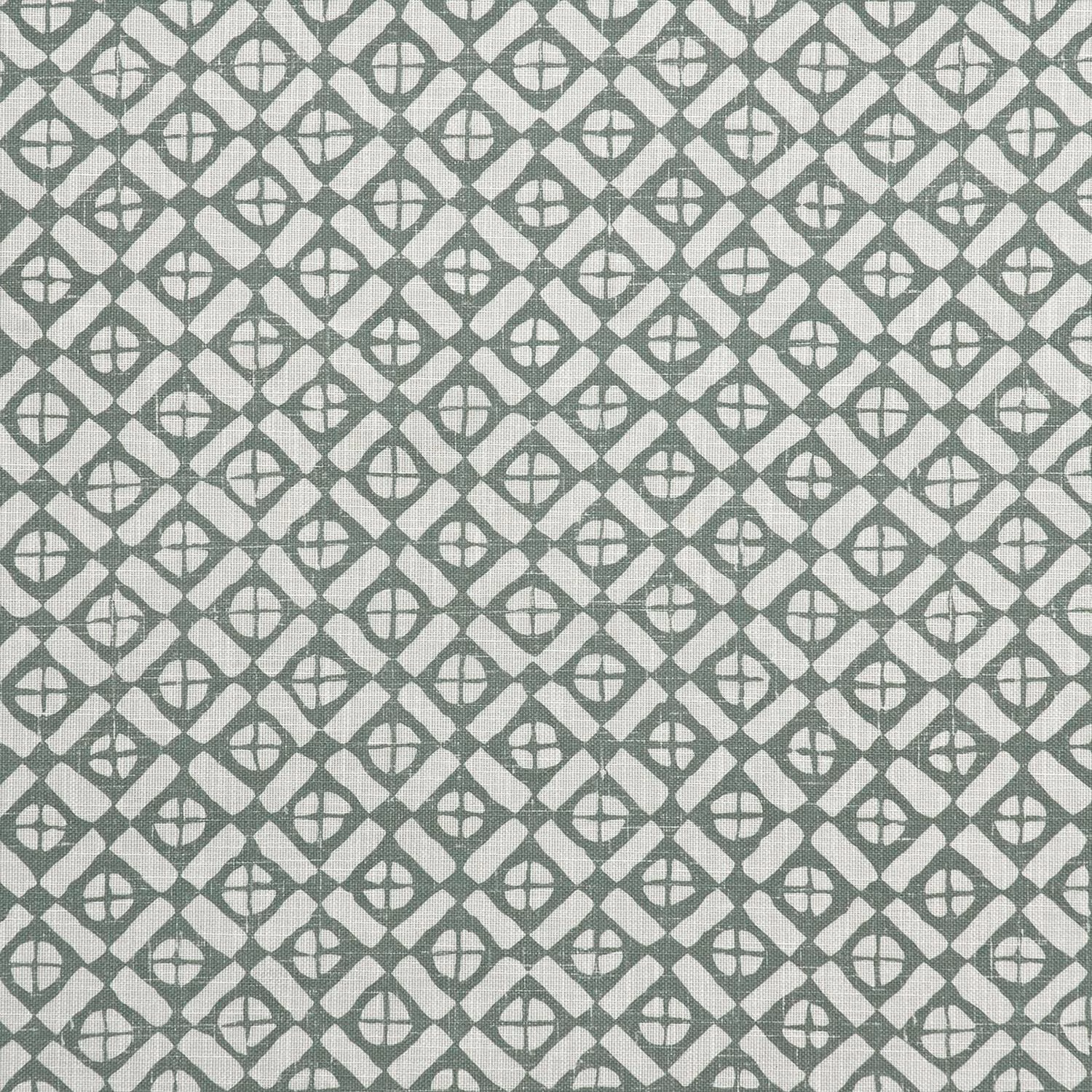 Muted celadon-green woven fabric with repeated cream diamond lattice motifs