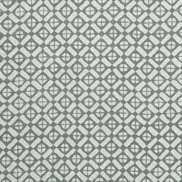 Muted celadon-green woven fabric with repeated cream diamond lattice motifs