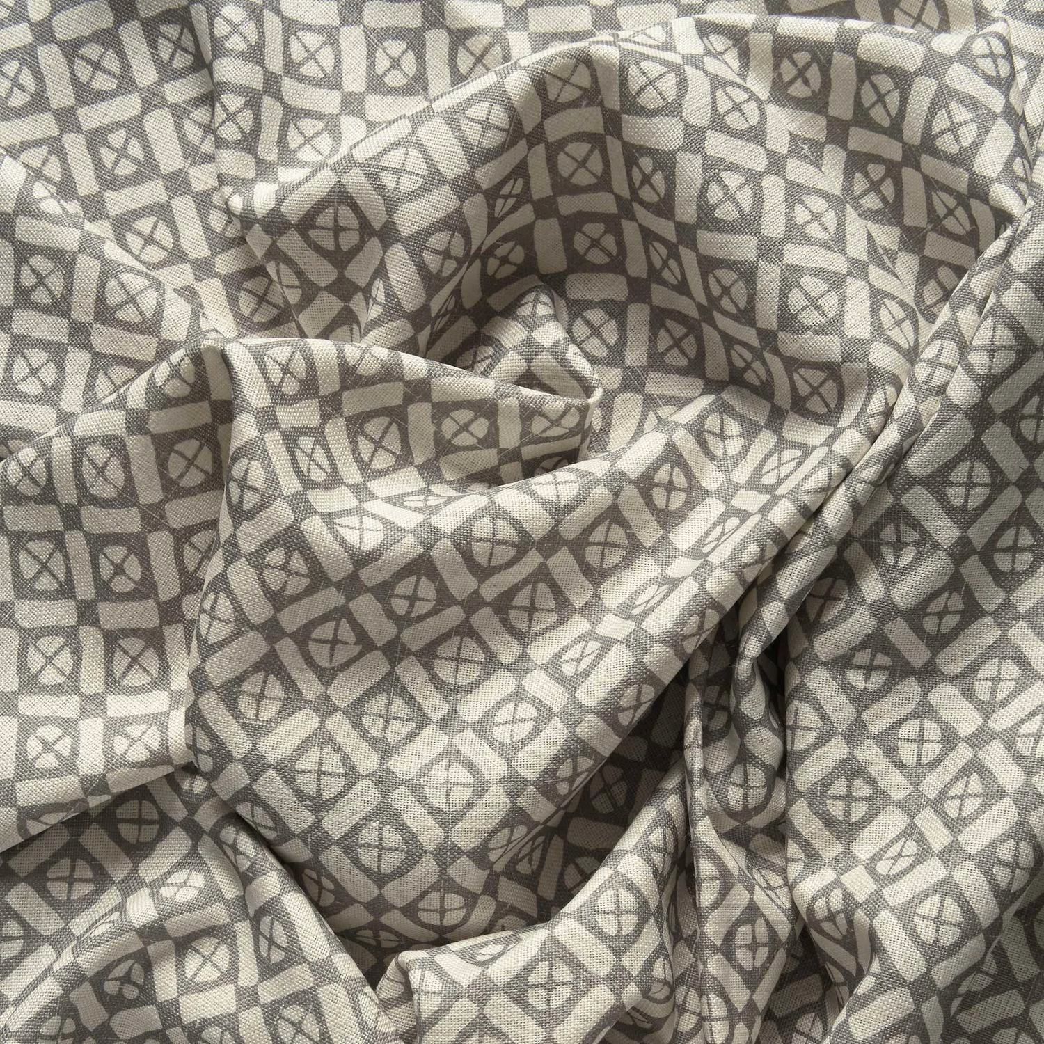 Stone-grey textile with charcoal linked diamond motifs and textured woven surface