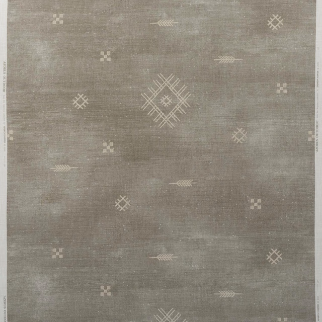 Smoke-grey woven fabric with ivory geometric diamonds, arrows and small cross motifs