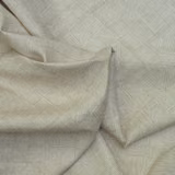 Pale greige geometric textile with fine taupe lines and softly folded textured cloth