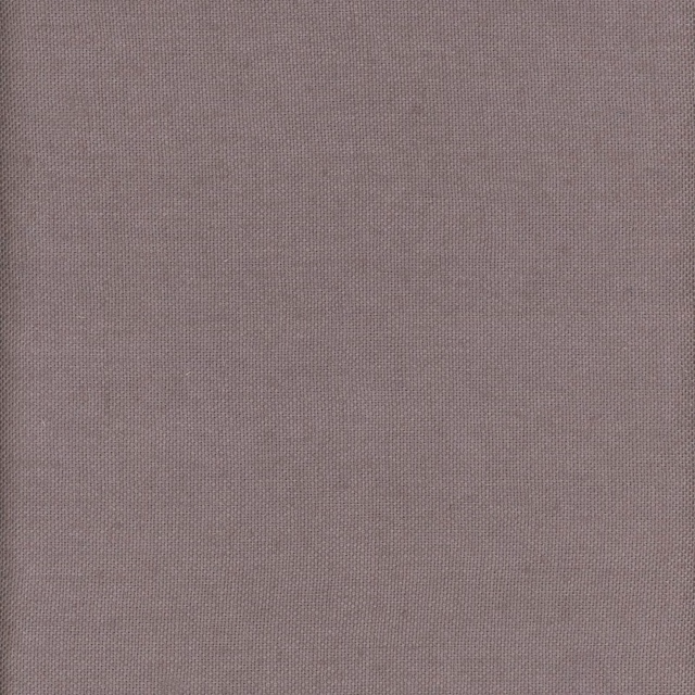 Close-up of muted berry-mauve linen with a fine, even plain weave