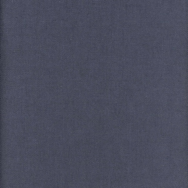 Close-up of deep slate-blue fabric with a fine, even plain weave