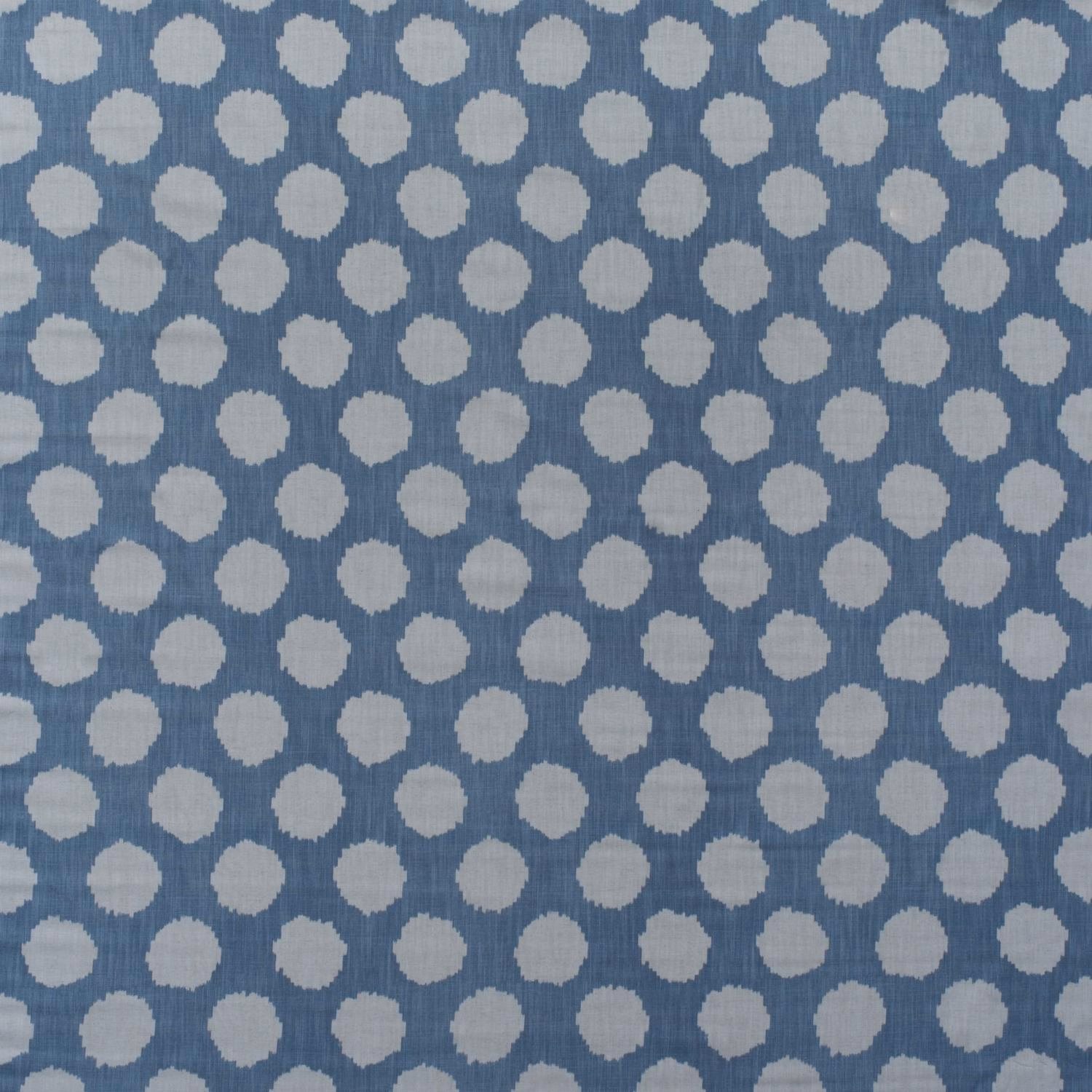 Cool denim-blue cotton print with staggered ivory pebble motifs and subtle vertical texture