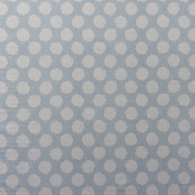 Duck egg blue cotton print with small irregular ivory beehive motifs and soft texture