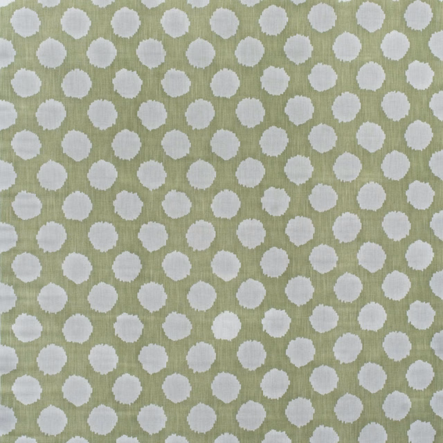 Muted fennel-green cotton with irregular chalk-white dots and fine woven texture