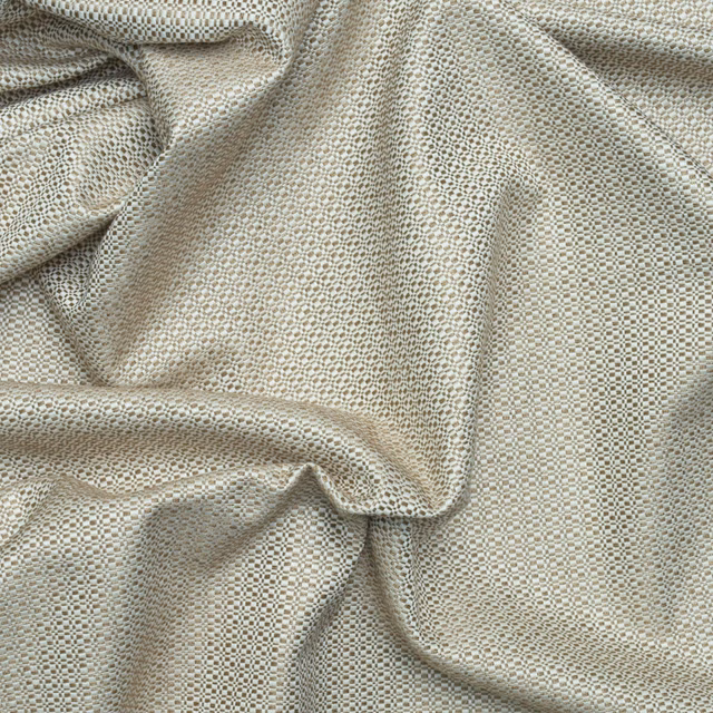 Pale birch greige fabric with tiny taupe-grey geometric weave in soft folds