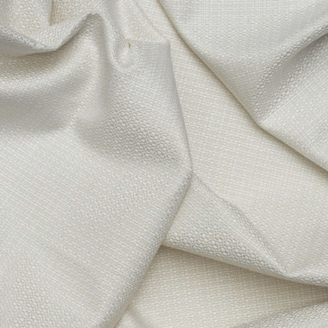 Pale chalk-cream woven textile with fine ribbing and softly pebbled surface in folded swatch