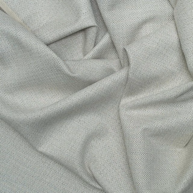 Close-up of cool storm-grey Birds Foot weave in softly folded cloth