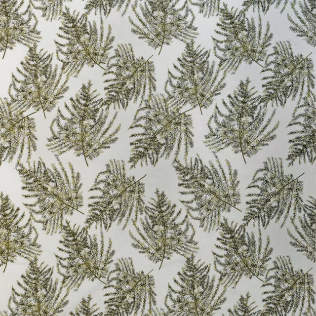 Muted sage and olive fern leaves embroidered across a pale cool-grey fabric ground