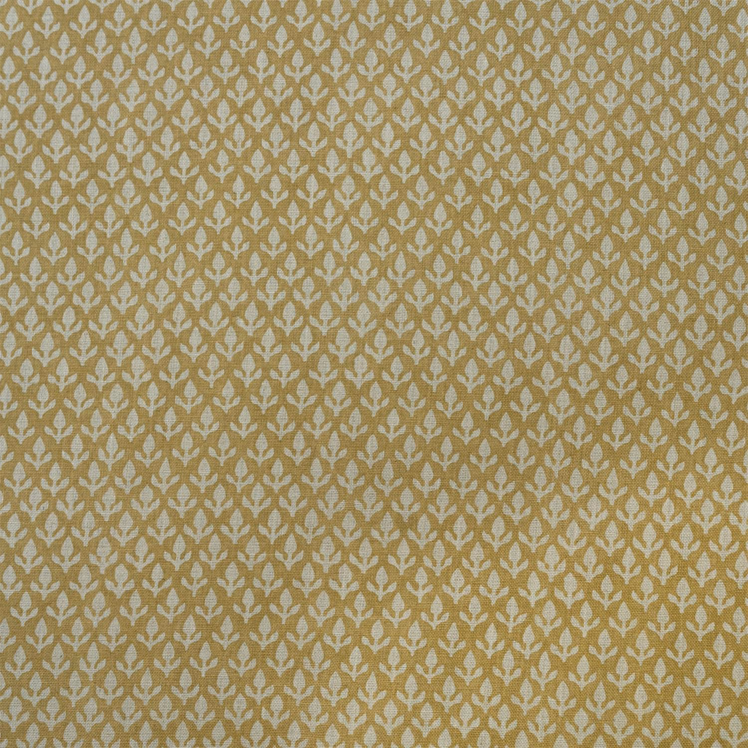 Warm honey-gold woven ground with dense ivory botanical motifs in a small repeat