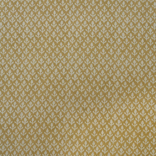 Warm honey-gold woven ground with dense ivory botanical motifs in a small repeat