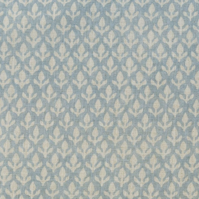 Soft sky-blue woven fabric with repeating small ivory leaf motifs