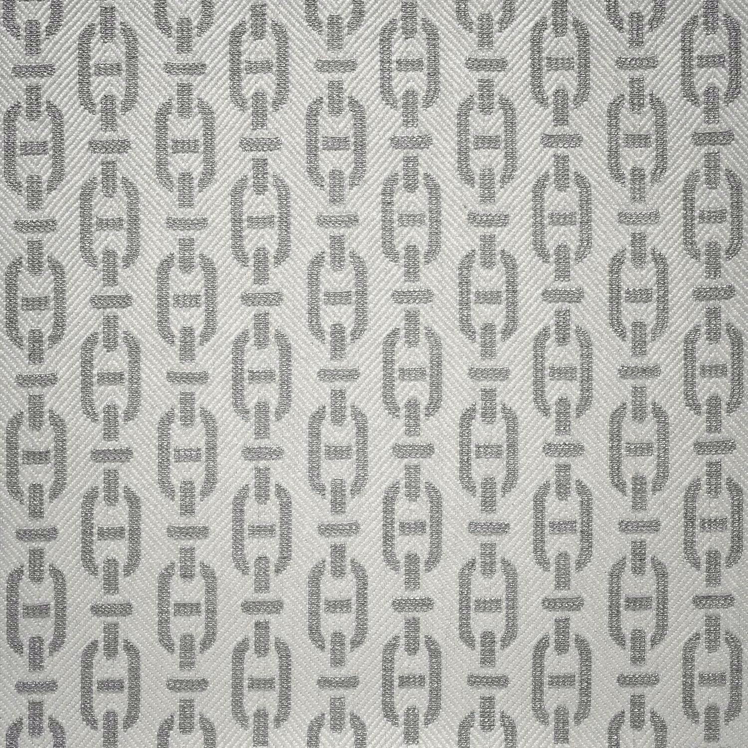Cloud-grey textile with repeating elongated geometric motifs and fine diagonal weave.