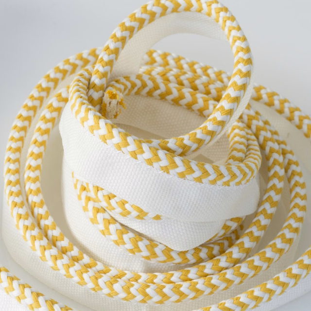 Ivory outdoor trim with saffron chevron braids coiled in overlapping loops