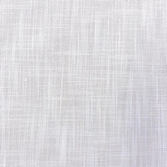Close-up of chalk-white woven outdoor fabric with a fine grey-white grid texture
