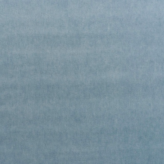 Close-up of muted blue-grey teal velvet with a soft, directional brushed pile