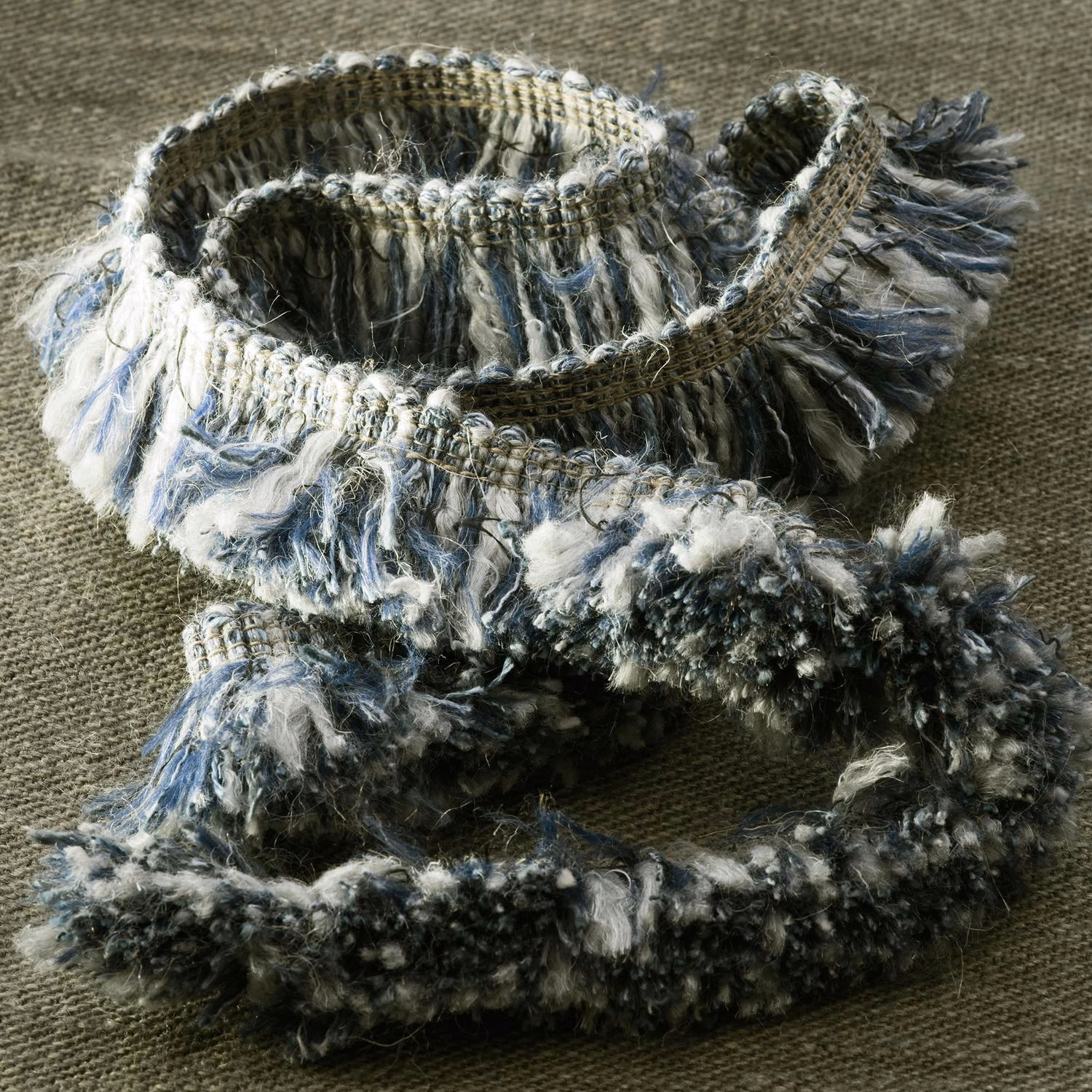 Smoky blue-grey, ivory and charcoal fringe trim with tousled looped texture