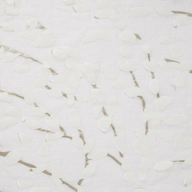 Near-white silver fabric with raised white confetti flecks and broken grey lines