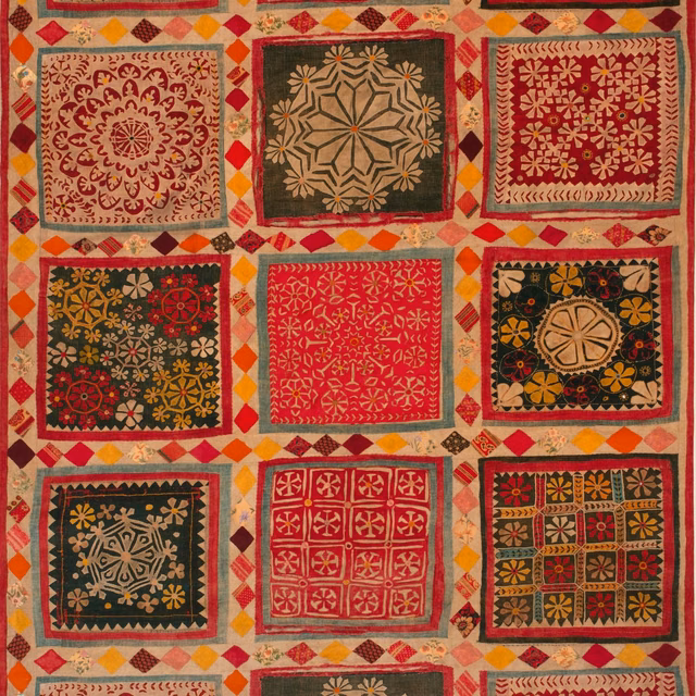 Red, mustard, olive and charcoal velvet with framed floral and geometric square motifs